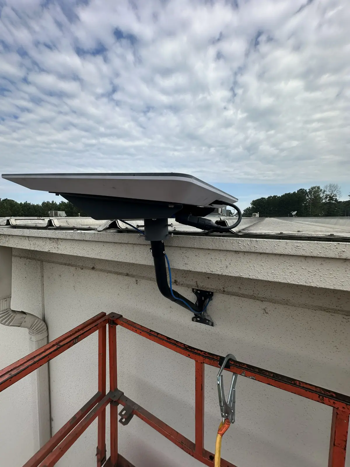 External connectivity hardware mounted near roofline